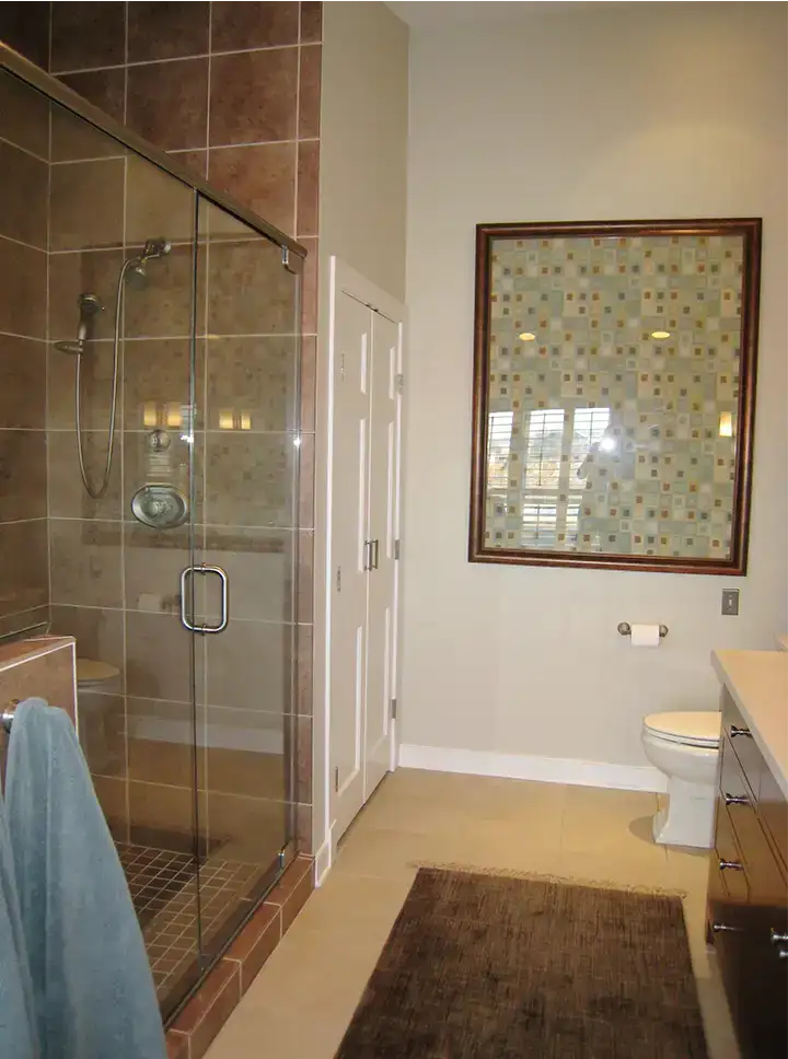 Main bath with large shower in place of vanity